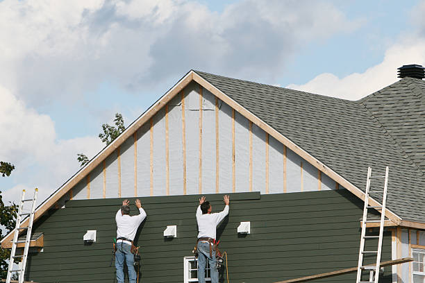 Professional Siding Installation technician working in Delta, PA